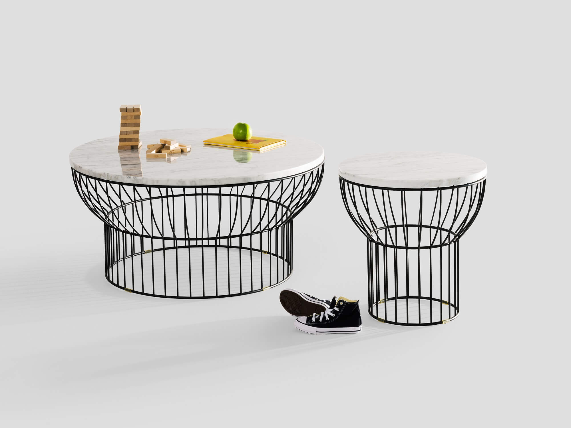 Round black wire coffee and end tables with jenga and snacks on top